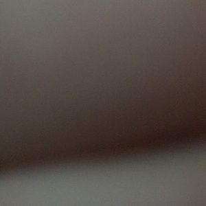 Glass sculpture of a unicorn and mermaid